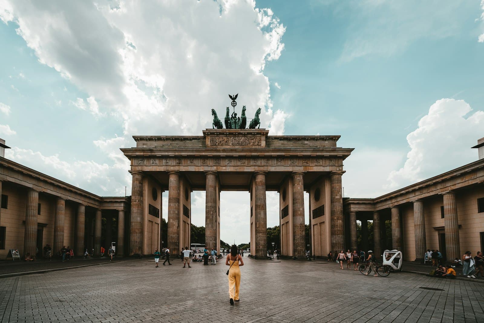 The Brandenburg Gate in Berlin under a bright sky
